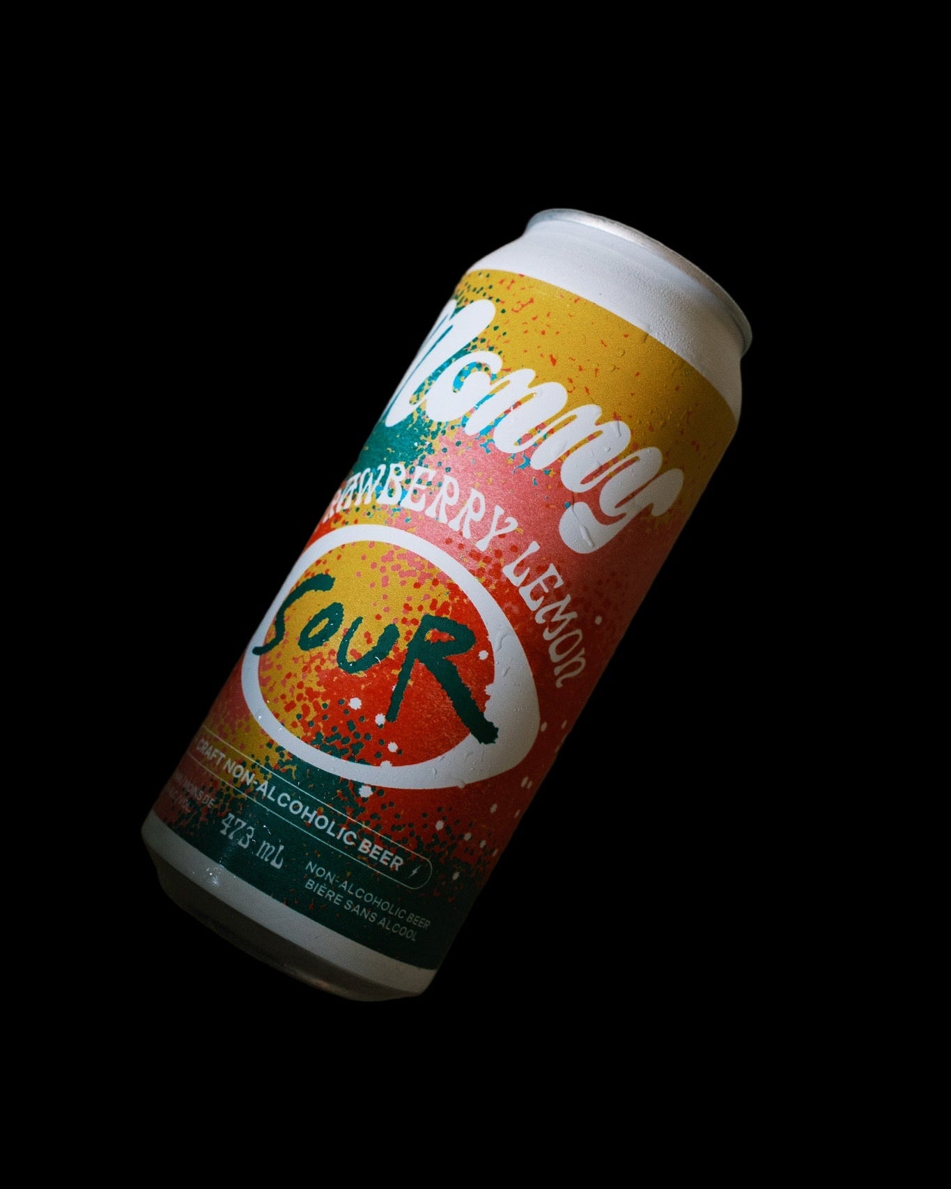 Sour beer can with colorful label on a beige background